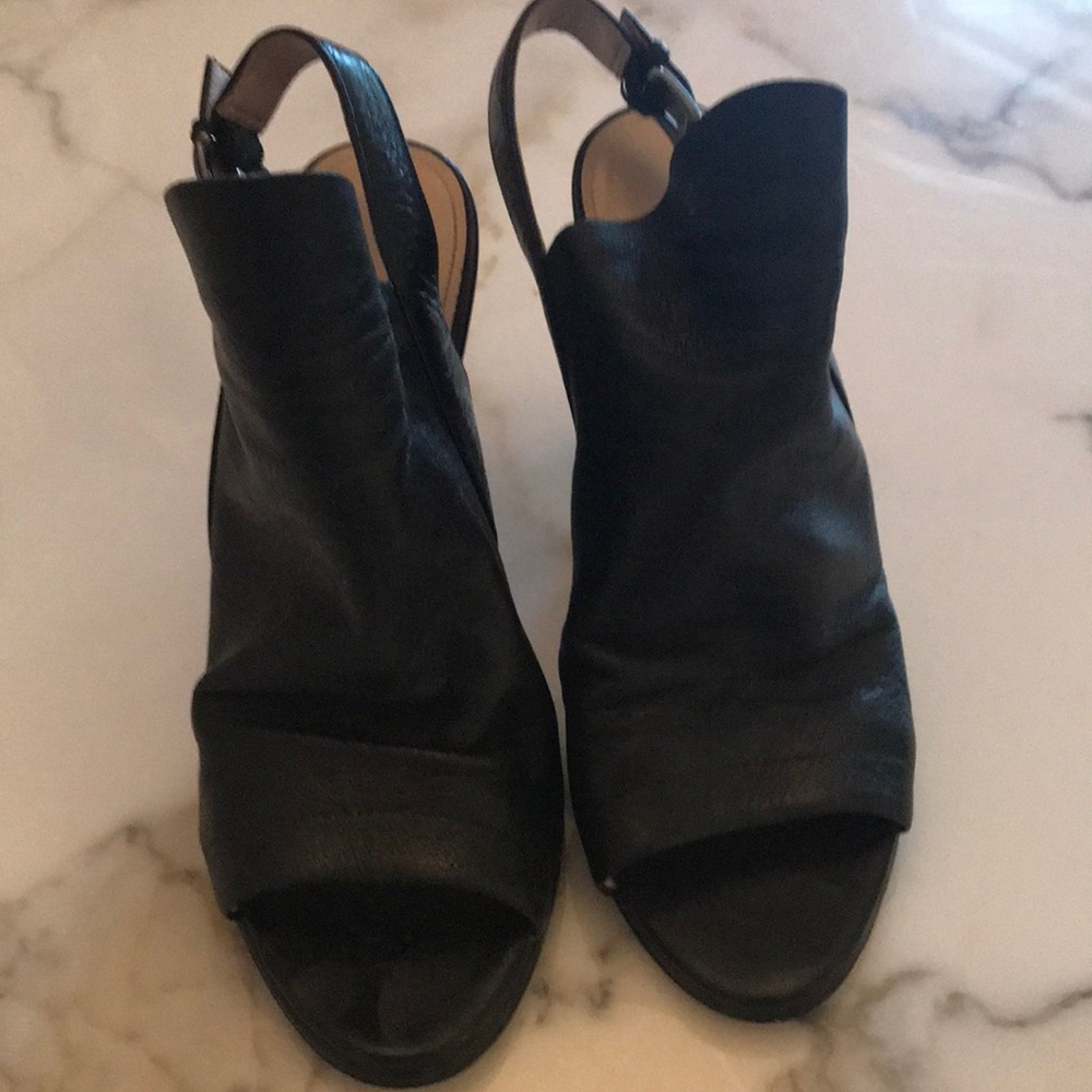 Black leather high-heeled mules